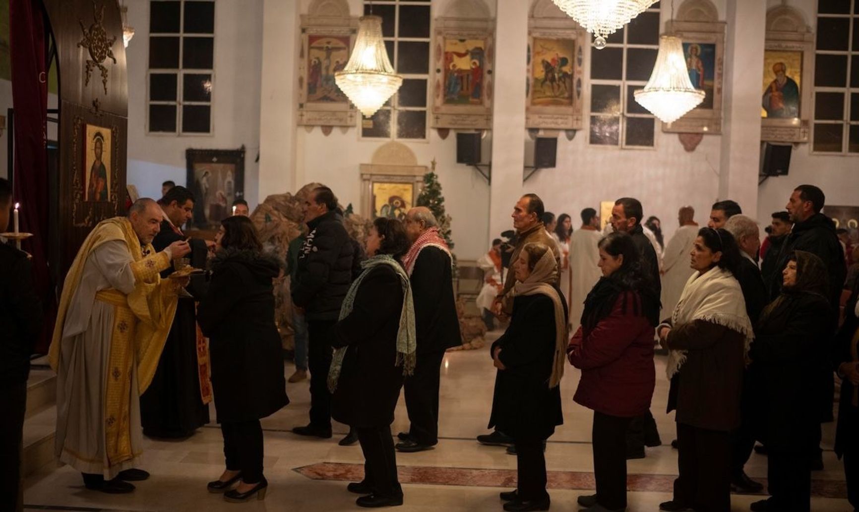 Christians celebrate Christmas at the Church of Saint George in Maaloula.