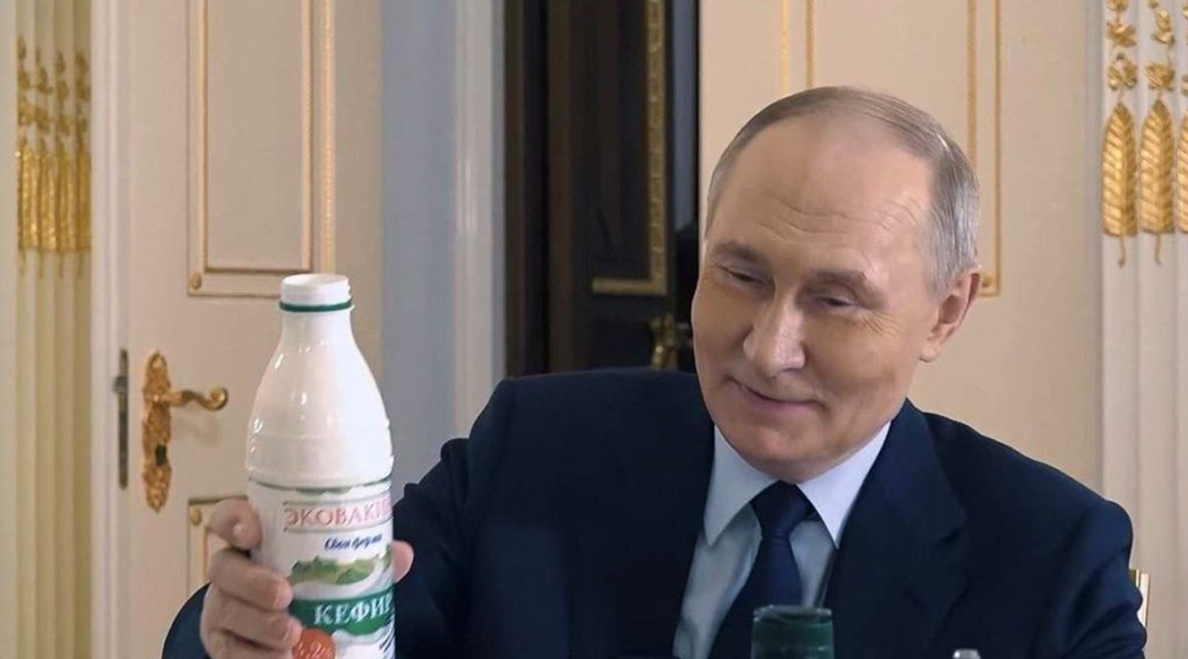 Putin holding EkoVakino kefir in the 2025 documentary. 