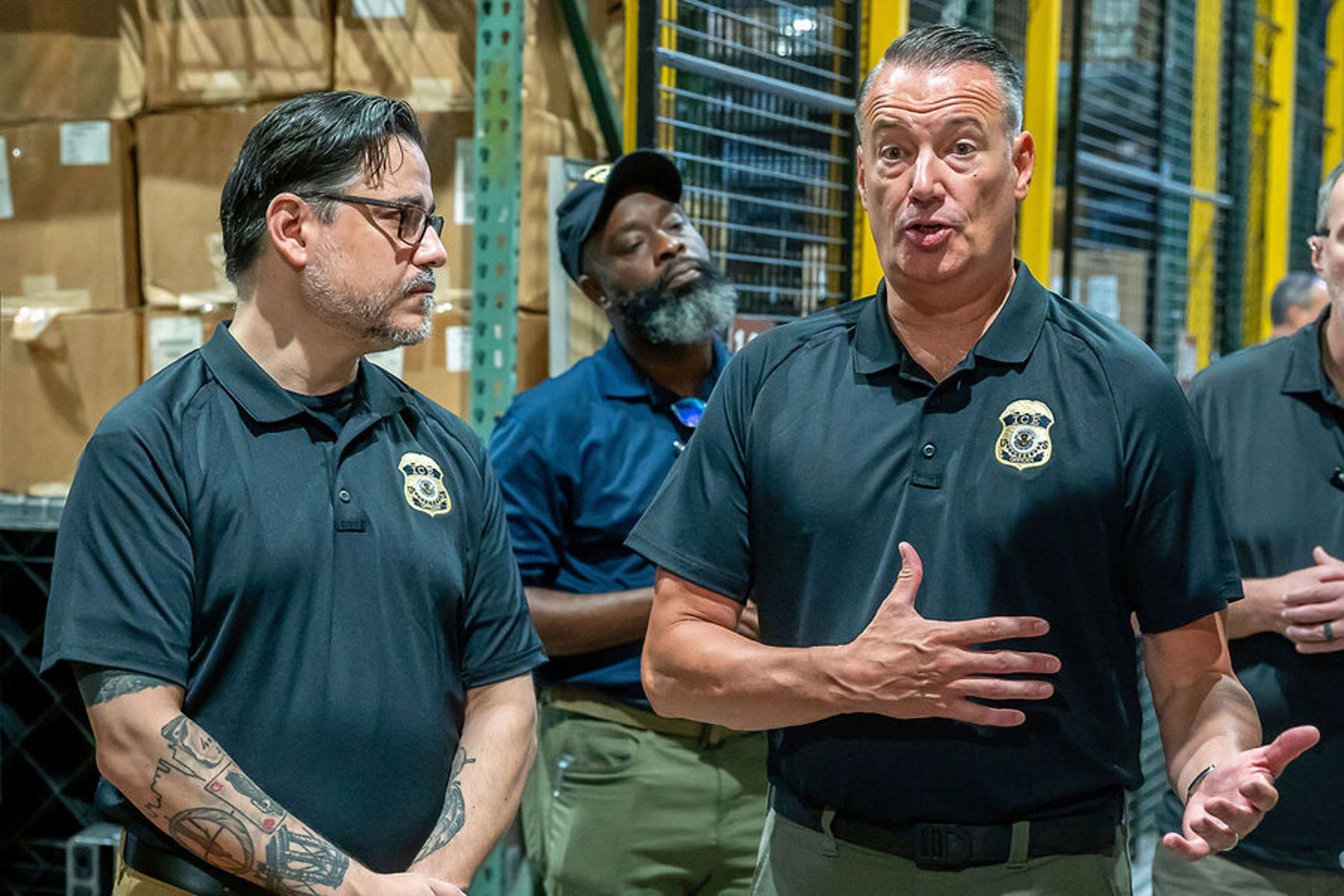 Acting ICE director Todd Lyons (far right)