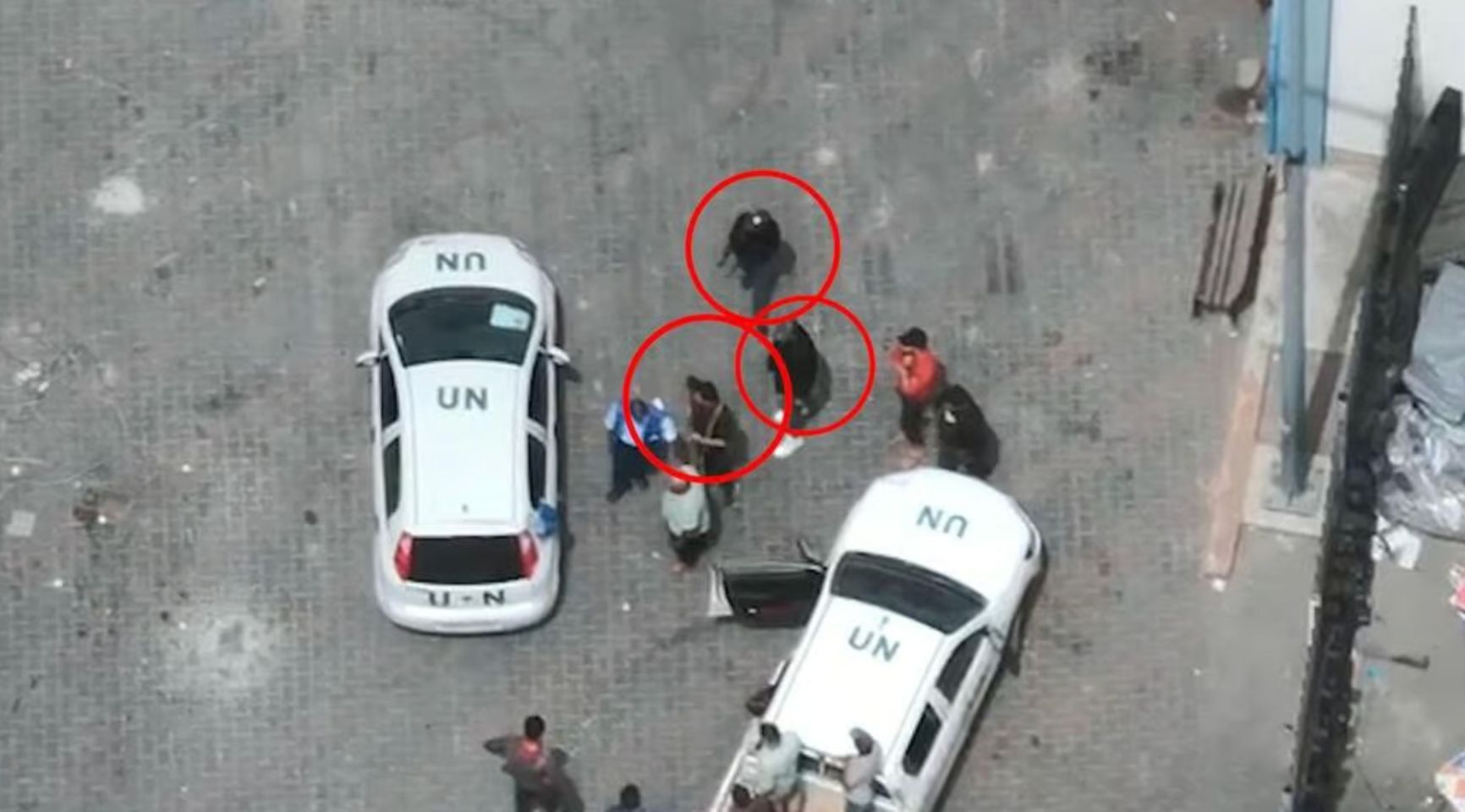 Terrorists near UN vehicles. Photo: IDF press service